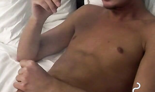 Tempting twink played with his cock and blowing smoke