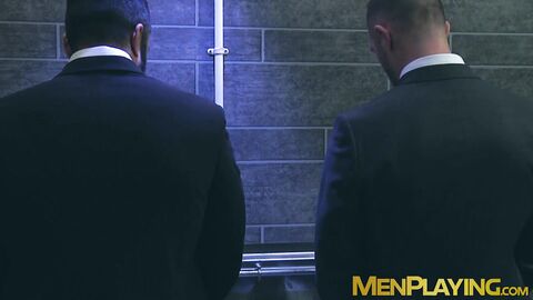 Sexy men in suit gets steamy on rough gay sex in a restroom