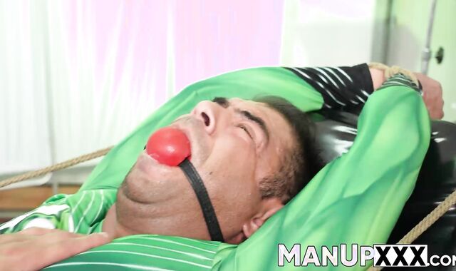 Hot and kinky jock receives drilling and a mouth gag