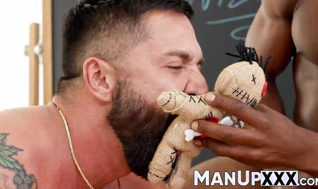 Man with a beard slaps himself while being restrained