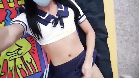 Schoolgirl crossdresser playing with herself