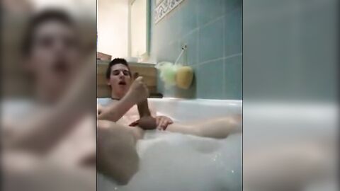 Twink jerking off in bathtub