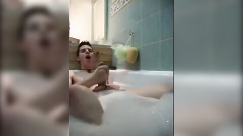 Twink jerking off in bathtub