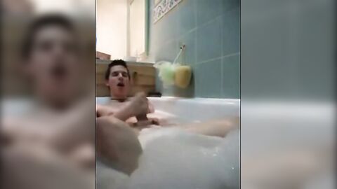 Twink jerking off in bathtub