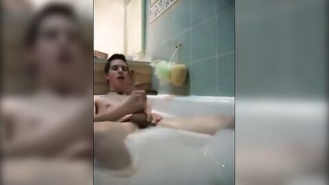 Twink jerking off in bathtub