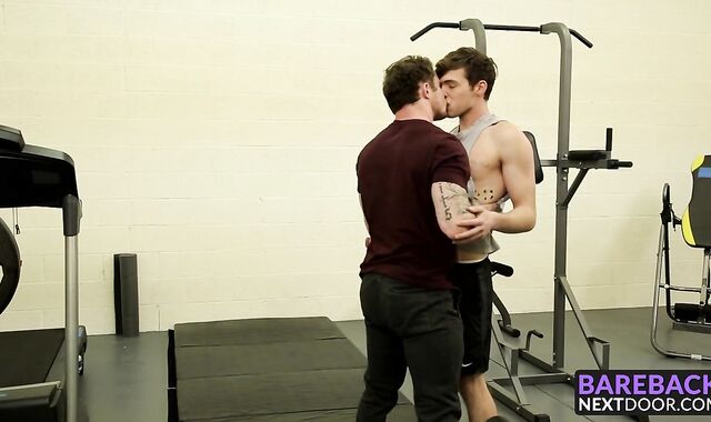 Tattooed hunk fucking this skinny dude in the ass at the gym
