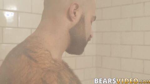 Atlas Grant shows off that bear body and tugs on his dick