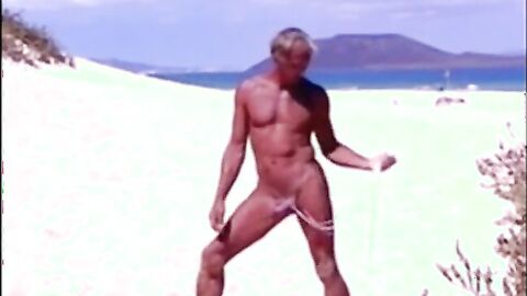 Tanned guy on beach in tiny string thong (temporarily!)