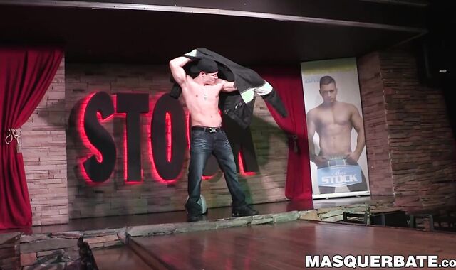 Muscular gay stripper takes off his clothes and masturbates