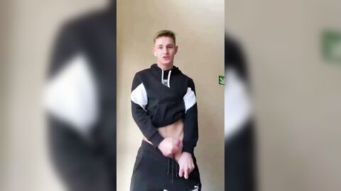 Adrian cumming in a gym uniform