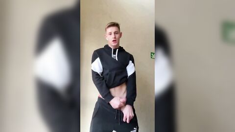 Adrian cumming in a gym uniform