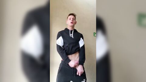 Adrian cumming in a gym uniform