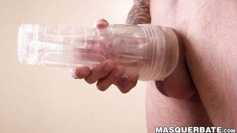 Handsome tattooed hunk masturbates and fucks a fleshlight