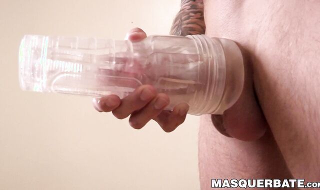 Handsome tattooed hunk masturbates and fucks a fleshlight