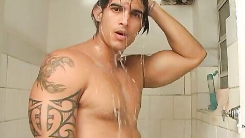 Muscular and hot Brazilian stallion masturbates after shower