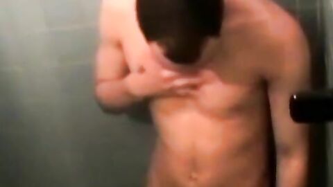 Handsome deviant masturbating passionately in bath