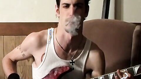 Axel loves pleasing his big dick with a blow of smoke