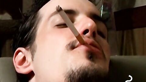 Axel loves pleasing his big dick with a blow of smoke