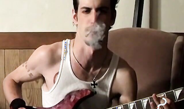 Axel loves pleasing his big dick with a blow of smoke
