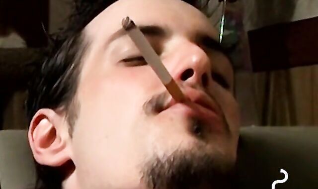 Axel loves pleasing his big dick with a blow of smoke