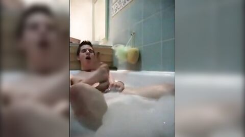 Twink jerking off in bathtub