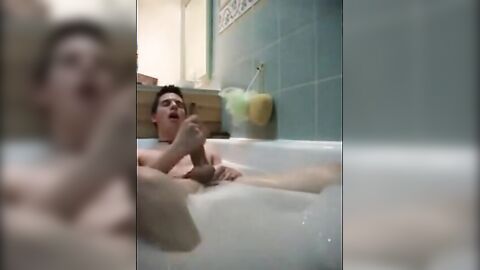 Twink jerking off in bathtub