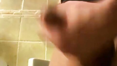 Young twink pissing before restroom masturbation