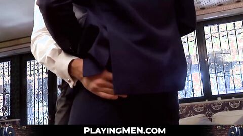 Two sophisticated office men wearing suits and ties in a hardcore anal