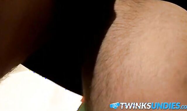 Skinny young twink jerks off his cock and cums in undies