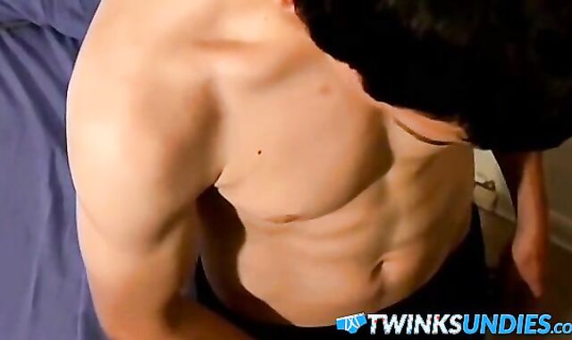 Skinny young twink jerks off his cock and cums in undies