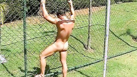 Unusual Brazilian muscle head jerks off on football field solo