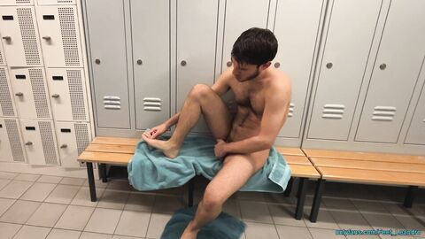 Playing with feet and dick in the locker room