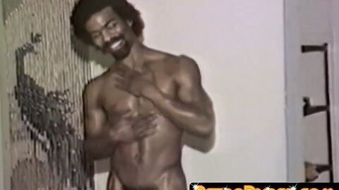 Ebony man with a hard cock masturbates in a vintage solo