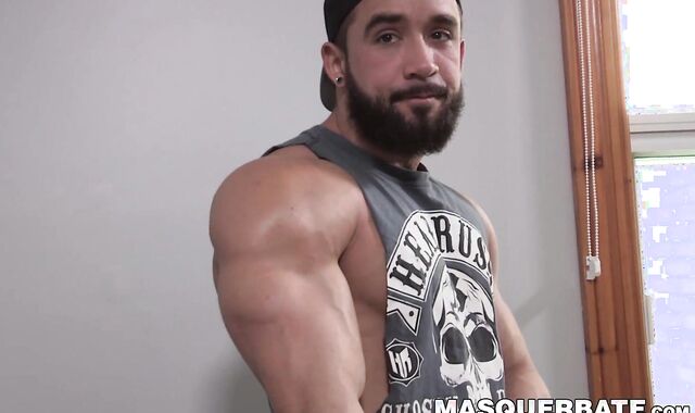Bearded guy Zack Lemec shows off his muscles during jerk off