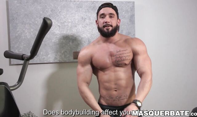 Bearded guy Zack Lemec shows off his muscles during jerk off