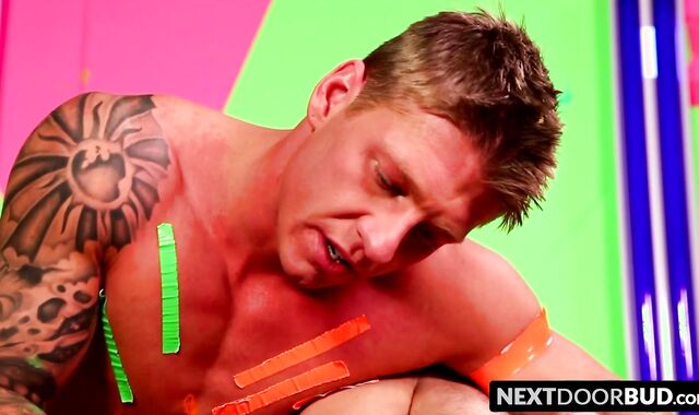 Three muscular homosexuals are licking and drilling asses