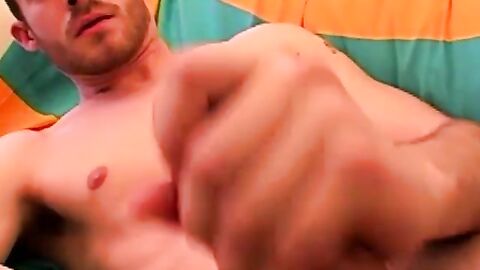 Young amateur strokes his big cock after an erotic interview