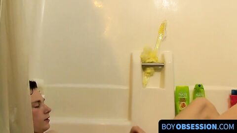Youthful dick darling having solo fun under a hot shower