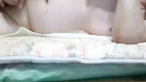Asian grandpa jerking off on the bed