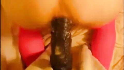 bitch in miniskirt and pink stockings riding her big dildo