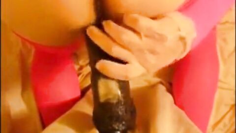 bitch in miniskirt and pink stockings riding her big dildo