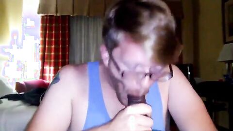 Big Black Cock Gets Serviced by a Hungry White Mouth