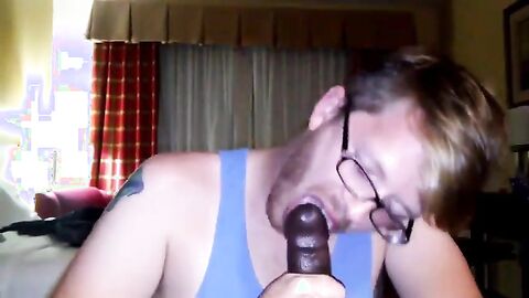 Big Black Cock Gets Serviced by a Hungry White Mouth