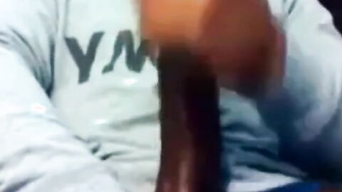 Hunk Strokes His Big Black Cock to Porn and Cums Twice