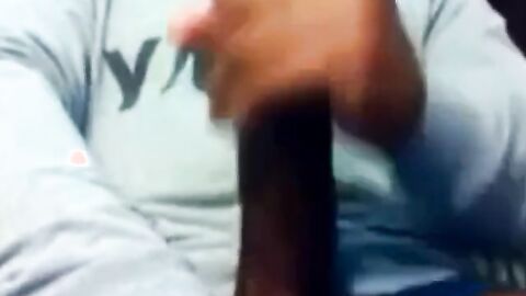 Hunk Strokes His Big Black Cock to Porn and Cums Twice