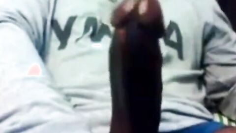 Hunk Strokes His Big Black Cock to Porn and Cums Twice