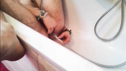 Twink Uses Shower Head for Enema and Masturbates