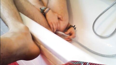 Twink Uses Shower Head for Enema and Masturbates