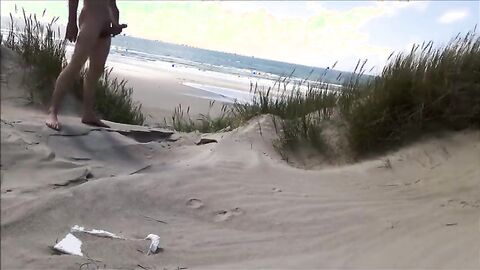 Exhibitionist Strokes Hard on the Beach