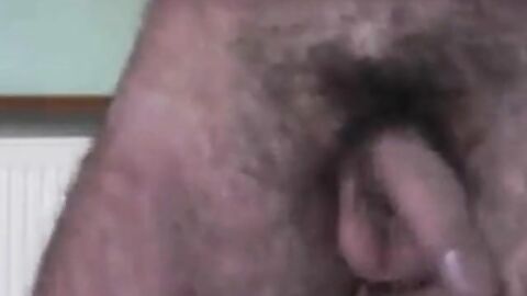 Hairy Daddy Strokes His Cock